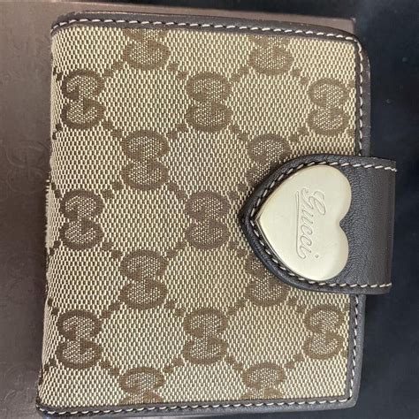 gucci heart wallet brown|checkered gucci wallet.